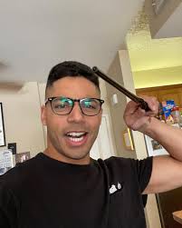 Behling stands at a height of 6 feet 2 inches (1.88 m). Michael Evans Behling