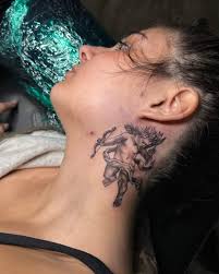 Iron Palm Tattoos & Body Piercings