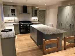 Full stave oak worktops, with wide, long planks. Howden S Tewkesbury Framed Skye Kitchen With Antique White Granite Worktop And Atkinson And Kirby Contempo Howdens Kitchens Oak Kitchen Cabinets Kitchen Design