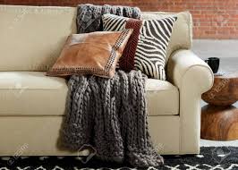 Shop items you love at overstock, with free shipping on everything* and easy returns. Cozy Interiors Living Room Sofa With Pillows And Knitted Blanket Close Up Knitted Plaid And Pillows On A Sofa At Home Home Cosiness Stock Photo Picture And Royalty Free Image Image 147695930