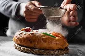 Check spelling or type a new query. Closeup Of A Caucasian Man Sprinkling Some Icing Sugar On A Roscon De Reyes A Spanish Three Kings Cake Eaten On Epiphany Day Placed On A Gray Rustic Table Stock Photo Picture