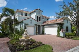 Mediterranean homes spanish design courtyard courtyard fountains patio courtyard landscaping spanish style homes outdoor architecture. Build Your Own House In Florida These Chic Florida Home Designs Are Full Of Style Blog Homeplans Com
