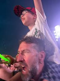 HE IS BACK!!!! Wacky dad Tracy Travers, who heads the non-profit Hunt  County Tunes for Tots, showed up decked out in green to walk his youngest  daughter to school this morning. Tracy