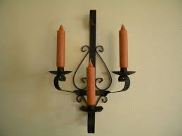 Explore candelabras and sconces for new ideas replacing electric light bulbs. Wrought Iron Wall Candle Holders Ideas On Foter