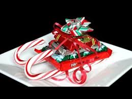 These colorful wrappers will be loved by little kids. Diy Candy Cane Sleighs For Christmas Homemade Gifts