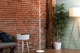 The concrete base was created using a frisbee as a mold. Coat Racks To Declutter Your Entryway Reviews By Wirecutter