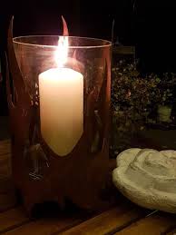 Flamme Laterne Edelrost Windlicht Fur Gemutliche Abendstunden Auf Der Terrasse Rost Vintage Rostige Gratendeko Feuerstelle Candles Candle Holders