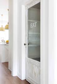 Custom sliding barn doors are a huge statement decor in luxury homes, be it farmhouse chic or urban minimalist interiors. Modern Farmhouse Antique Pantry Door Farmhouse Kitchen Austin By Nuela Designs Houzz