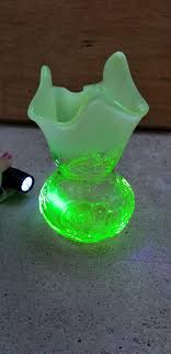 Uranium glass is radioactive but the irradiation is not dangerous, practically without significance. I Found A Vase Made From Uranium Glass This Type Of Glass Is Mildly Radioactive And Glows Brightly Under Blacklight From A Trash Bag On Somebody S Curb Dumpsterdiving