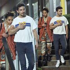 Shia saide labeouf is a famous american actor and director. Fka Twigs Rests Her Head On Boyfriend Shia Labeouf During Bel Air Dinner Date Mens Outfits Shia Labeouf Military Boots Outfit