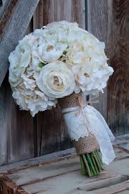 The common way is to use them tied around mason jars or bouquets. Burlap And Lace Bridal Bouquet Lace Bridal Bouquet Bridal Bouquet Wedding Flowers