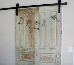 Old bifold closet doors used to hide a gap in neighbor's fence and hang plants. 13 Amazing Closet Door Transformations That Will Change Your Room Hometalk
