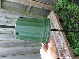 Bird Feeder Pole With Baffle Chipmunk Baffle For Bird Feeder Pole Made From Reused Empty Plant Pot And Hose Bird Feeder Poles Squirrel Proof Bird Feeders Bird Feeder Baffle