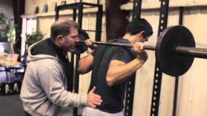 How To Do A Low Bar Squat The Art Of Manliness Squats Video Squat With Bar Kettlebell Training