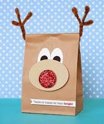 Create your own gift bags using lunch brown paper bags, some colored paper and brown chenille wire. Diy Cute Idea Reindeer Gift Bag Teacher Holiday Gifts Cute Christmas Gifts Reindeer Gifts