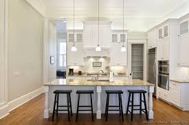 Kitchen Of The Day A Classic White Kitchen With Extra High Ceilings Over Traditional White Kitchen Cabinets White Kitchen Traditional White Kitchen Cabinets