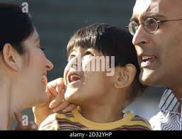 A happy day for Zain Hashmi and his parents Raj (rt) and Shahana after the  judgement allowing their proposed treatment to save the life of their  four-year-old son, who suffers from a