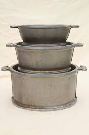 Maybe you would like to learn more about one of these? 1940s Vintage Guardian Service Ware Aluminum Cookware Dutch Oven Pots And Pans Stack
