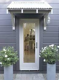 Browse Domestic Science Archives On Remodelista House Exterior Modern Entry Door Awnings