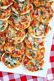 Make Your Own Mini Pizzas Homemade Pizza Dough Recipe Pizza Bites Recipes Cooking Recipes