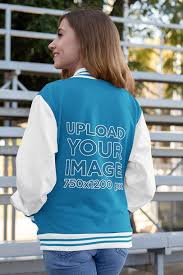 Download Placeit Back View Mockup Of A Woman Wearing A Varsity Jacket