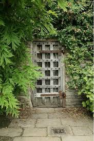 Garden and entry gates are as varied as architectural and landscape design styles. Pin By Jason Gulenchin On Places Spaces Garden Gates Garden Doors Secret Garden Door