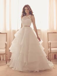 Known as blue bird dress in the beginning, the company changed their name to paloma blanca and later introduced sister collection and brand, mikaella. Win Your Dream Wedding Dress Bespoke Bride Wedding Blog