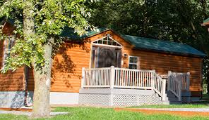 One side is one bedroom, 1 bath with kitchen, dining and living room. Cabins Basic Log And Deluxe Hersheypark Camping Resort