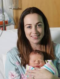 Mum gives birth to baby boy after she was rescued in a kayak from flood  waters in Brisbane