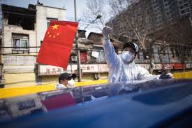 A chinese flag waves in the back of a boat, june 15, 2021, at nanhu lake in jiaxing. How Chinese Social Media Platforms Control Information On Covid 19 Ifex