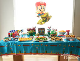 The classic cupcakes are vanilla with vanilla buttercream the toadstools have vanilla cupcake faces, and their tops are chocolate mousse with brownie discs inside. A Super Mario 5th Birthday