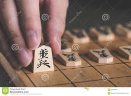 Japón cuenta con una larga historia y tradición de juegos de mesa. Juegos De Mesa Japoneses De La Estrategia Del Ajedrez En Japon Foto De Archivo Imagen De Defensa Invertido 93786464