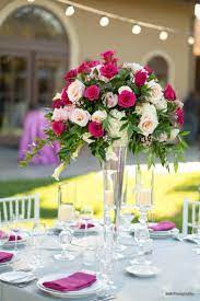 Obsessed With This Tall Centerpiece The Mix Of Blush And Fuchsia Flowers Fuschia Wedding Centerpieces Wedding Floral Centerpieces Flower Centerpieces Wedding