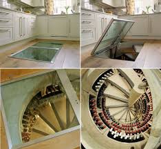 The above photo is of a staircase that rises to reveal a hidden room. 21 Secret Rooms For Homeowners Who Have Something To Hide