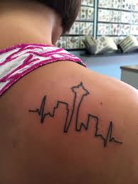 No one else in the puget sound area, from federal way to bellingham, offers the cutera enlighten laser, which ensures your tattoo will be removed with the least discomfort, with the fewest treatments possible. Seattle Skyline Tattoo Skyline Tattoo Tattoo Designs Tattoos