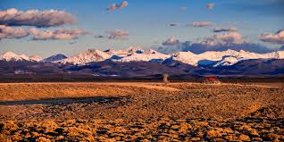 A kaleidoscopic sunset splashes across the sky and over the sagebrush sea at arapaho national wildlife refuge in colorado. Colorado S Rugged North Park Region