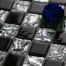 The mirrored tile backsplash contrasts nicely with the casual wicker stools. Black Glass Tile Backsplash Crystal Mosaic Wall Tile Square Kitchen Backsplash Tiles Bathroom Floor Sticker Mirror