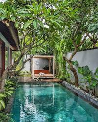The Luxury Bali Experience The Feeling Of Coming Home To This Beautiful View At The Villa At Th Pool Houses Backyard Pool Designs Tropical Pool Landscaping