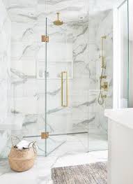 Luxurious White And Gray Marble Shower With A White Niche Enclosed With Glass Doors And Bathroom Interior Design White Marble Bathrooms Modern Bathroom Design