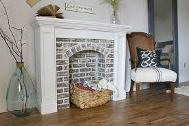 A fireplace surround is an architectural element which surrounds a fireplace, providing aesthetic and safety benefits. If You Re Going To Make It You Better Fake It Diy Fake Brick Fireplace