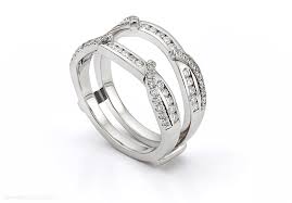 Is the #1 supplier of fine jewelry, findings, mountings, tools, packaging, diamonds and gemstones for today's retail jeweler. Wrap Your Ring In Diamonds With An Enhancer Wedding Ring