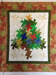 A Quilt And A Prayer Piecing With A Twist Quilts Twister Quilts Holiday Quilts