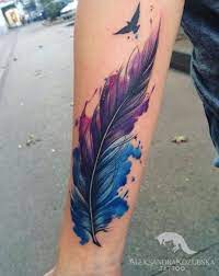 The feather tattoo is suitable for women given the colourful blend. 62 Beautiful Feather Tattoos With Meanings