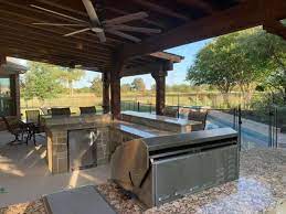 A good outdoor living design can include a kitchen as well, but can also be a convenient place to take a break, get some shade by the pool, watch the. Outdoor Kitchen Design Texas Best Fence Patio