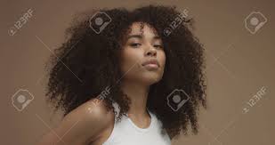 And if you want to try short haircuts, these 15+ black girls with short hair will help you for. Mixed Race Black Woman Portrait With Big Afro Hair Curly Hair Stock Photo Picture And Royalty Free Image Image 93437640