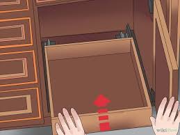 Comment Installer Des Etageres Coulissantes Dans Un Meuble De Cuisine Meuble Cuisine Etagere Coulissante Amenagement Tiroir Cuisine