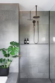 The entire surface will blend together to give a uniform aesthetic. For Continuity The Same Concrete Look Tiles And Walnut Veneer Are Used In Both The Home S Bathroo Natural Bathroom Bathroom Inspiration Bathroom Design Luxury