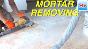 Placing a sheet or towel on top of the tile while working keeps down the flying shards and dust. How To Remove Mortar And Grout Removal From Plywood Subfloor For Leveling Mryoucandoityourself Youtube