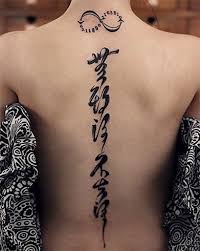 Tattoo designs on spine looks super cool. Cool And Unique Spine Tattoos