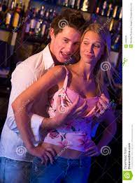 Young Man in a Nightclub Grabbing Breasts Stock Image - Image of humor,  harassing: 5488009